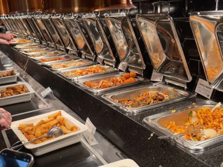 Buffet chafing dishes set up for a Shakeel Pakwan event