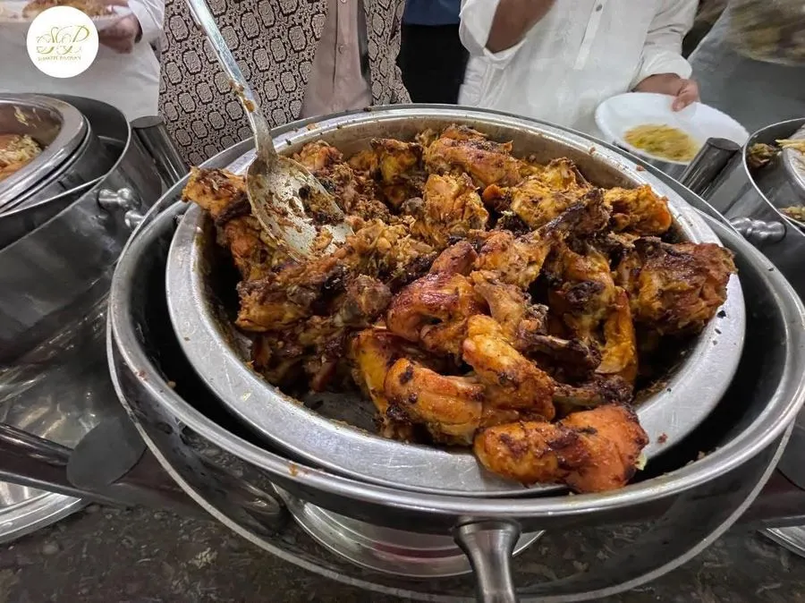 Grilled chicken tikka served at an event